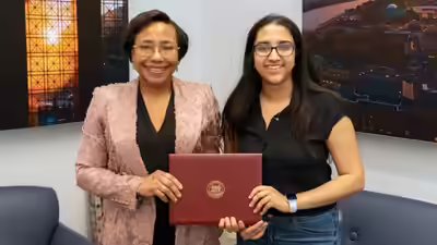 Avani ahuja right receives the henry ford ii scholar award.jpg