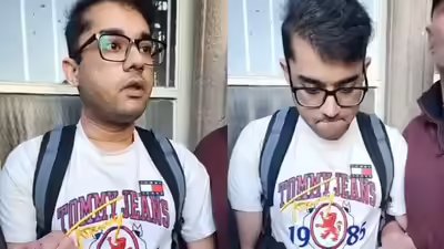 Indian man being confronted by a group.jpg