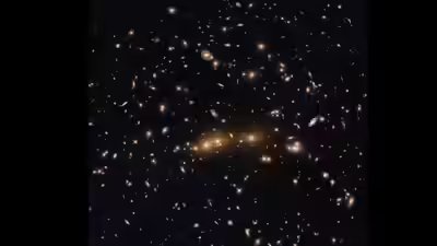 Nasa39s hubble spots two enormous galaxy clusters merging billions of light years away.jpg