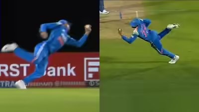 Shubman gill takes one handed blinder.jpg