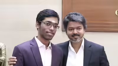 Tamil nadu cm vijay with norway chess champion r praggnanandhaa screengrab.jpg