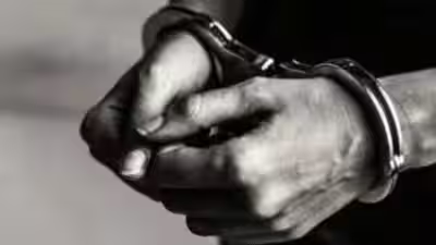 1784666352 arrested.jpg