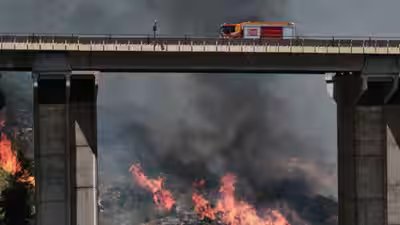 A firefighter truck next to a wildfire in los gallardos near almeria spain.jpg