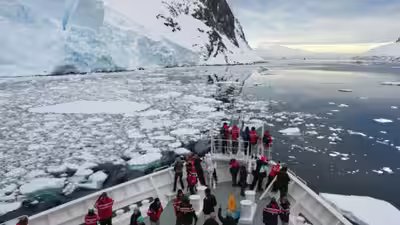 A ship sails through the lemaire channel in antarctica ap file photo.jpg