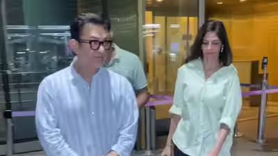Aamir khan returns to mumbai with wife gauri spratt stepson left puzzled by paparazzi rush.jpg