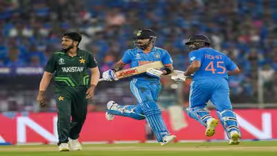 Ahmedabad india39s rohit sharma and virat kohli run between the wickets during t.jpg