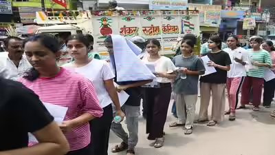 Patna jun 21 ani aspirants wait in a queue outside the examination centre to.jpg