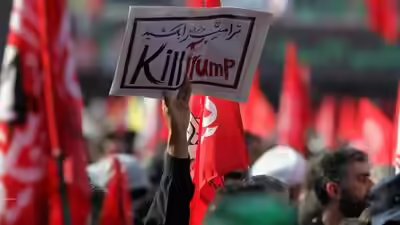 Posters from khameneis funeral.jpg
