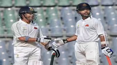 Sachin tendulkar and ajinkya rahane.jpg