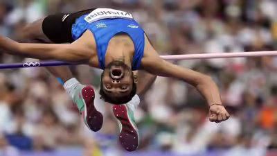 Sarvesh anil kushare of india competes during the men39s high jump qualificatio.jpg
