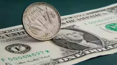 1786943479 rupee slips against us dollar.jpg