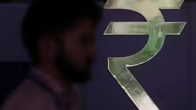 1787031555 rupee weakens against us dollar.jpg