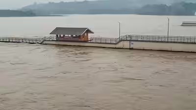 A view of the swollen ganga river as the water level rise.jpg