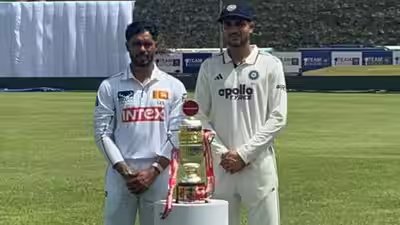 Dhananjaya de silva and shubman gill.jpg