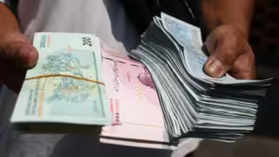 Iranian currency sinks to record low as us works on new sanctions.jpg