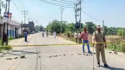 Jammu may 02 ani a jammu and kashmir police personnel stands guard at the br.jpg