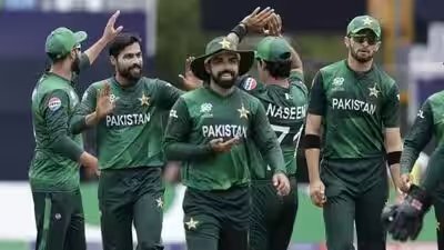 Pakistans mohammad amir second left celebrates with teammates after the dismissal file photo.jpg
