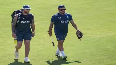 Rajkot england39s captain ben stokes with head coach brendon mccullum during a t.jpg