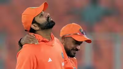 Rohit sharma with t dilip.jpg