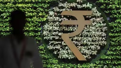 Rupee slips against us dollar.jpg