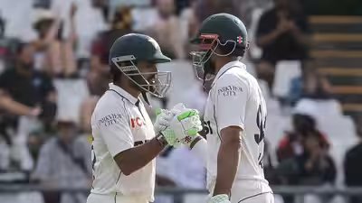 Shan masood and babar azam.jpg