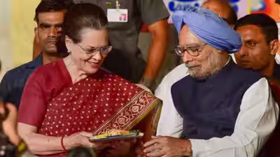Sonia gandhi with former pm manmohan singh pti file photo.jpg