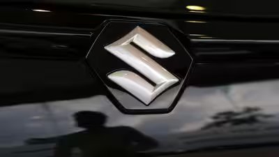 Maruti plans small ev push targets wider charging infrastructure.jpg